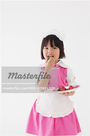 Japanese Girl holding Eating Strawberry