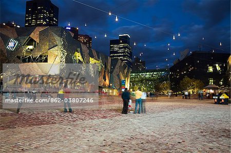 Australia, Victoria, Melbourne.  Federation Square by night.