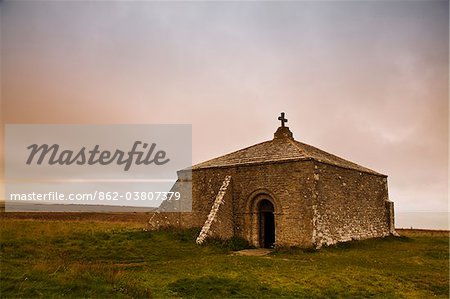 England, Dorset, St Aldhelm's Chapel.  This isolated chapel, dedicated to St Aldhelm, first Bishop of Sherborne, stands on cliffs 108m above sea level on St St Aldhelm's Head in the parish of Worth Matravers.