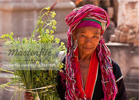 Myanmar, Burma, Kekku. Palaung tribal lady on pilgrimage from her village, attending the Full Moon festival at Kekku.