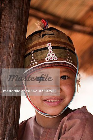 Myanmar, Burma, Keng Tung (Kyaing Tong). Young Akha girl in a hill village, Keng Tung.