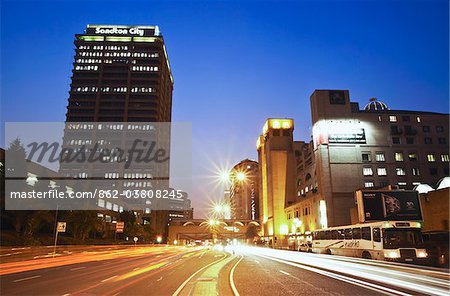 Light trails of traffic passing through downtown Sandton, Johannesburg, Gauteng, South Africa