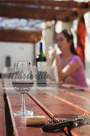 Woman tasting wine at Blaauwklippen Wine Estate, Stellenbosch, Western Cape, South Africa Woman tasting wine at Blaauwklippen Wine Estate, Stellenbosch, Western Cape, South Africa