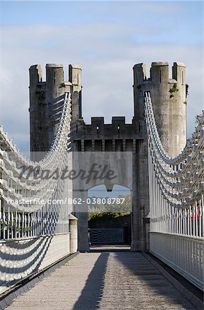 UK, North Wales; Conwy. The  elegant Suspension Bridge built by Thomas Telford across the Conwy River to the imposing Castle.