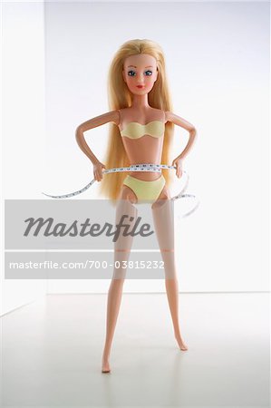 Poupée mesure taille avec ruban à mesurer Poupée mesure taille avec ruban à mesurer
