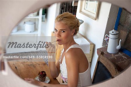 Girl tasting cake