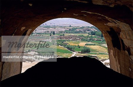 Afganistan, Bamiyan.View of the plain taken from on top of the large head of the Buddha.Bamiyan flourished as a centre for trade and religious worship until 1221, when the area was attacked by the armies of Genghis Khan.