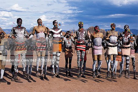 Karo men dance by jumping up in the air holding hands. Each age group of warriors come forward in turn and dance together, advancing as they dance higher and higher until they finish with a last high leap. A small Omotic tribe related to the Hamar, the Karo live along the banks of the Omo River in southwestern Ethiopia.
