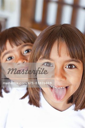 portrait of two smiling young girls