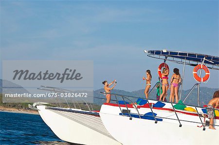 young people partying on yacht