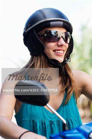 A Scandinavian teenage girl on a vespa, Thailand.