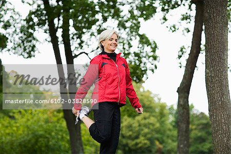 A woman doing stretching exercises, Stockholm, Sweden.