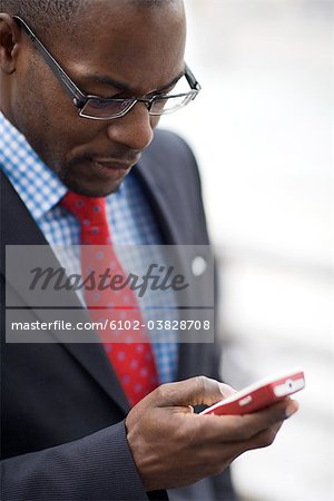 A businessman using a cellphone, Stockholm, Sweden.