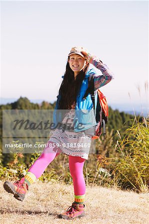 Young Woman Enjoying Nature Arm Raised