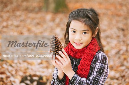 Girl Holding Pine Cone