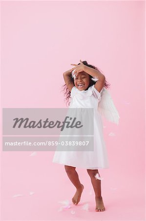 Girl playing In Feathers