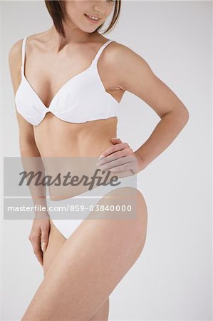 Young Woman Posing In Underwear