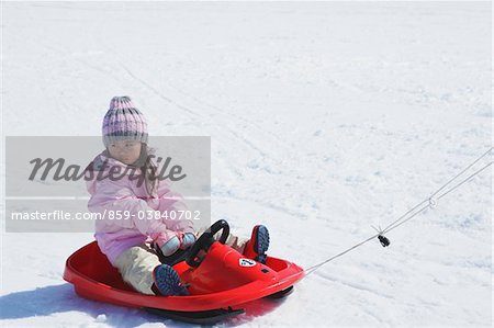 Small Girl on sledge