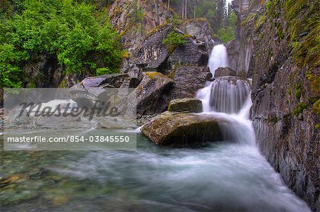 View of Liberty Falls at Liberty Falls State Campground near Chitina, Southcentral Alaska, Summer, HDR image.