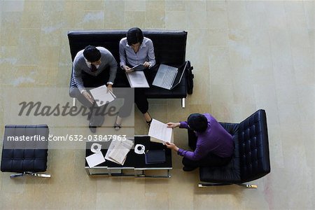 Executives working together, overhead view