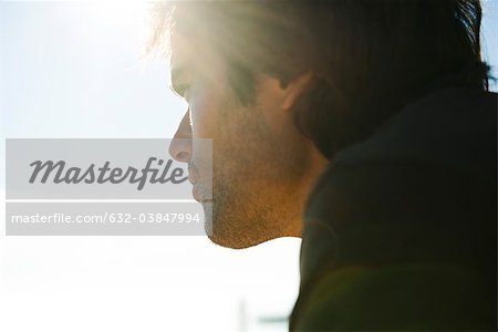Man looking away in thought