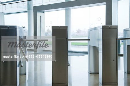 Turnstiles in building lobby