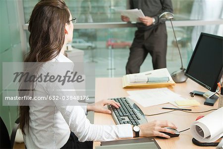 Businesswoman working with colleague