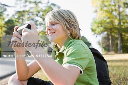 Boy using Cell Phone