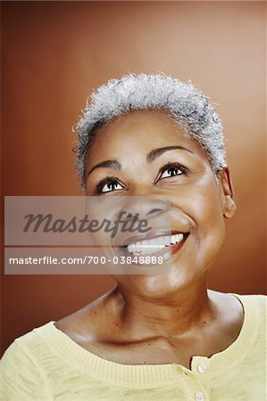 Portrait of Smiling Woman Looking Up