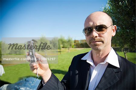 Man taking Pictures at Wedding