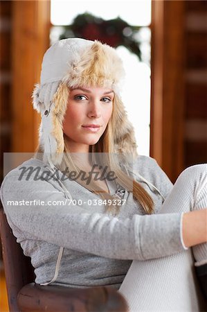 Portrait of Woman Wearing Thermal Underwear in Log Cabin