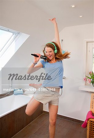 Girl singing in bathroom