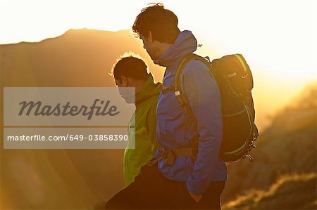 Men hiking on mountainside