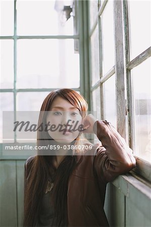 Pretty Young Woman In Waiting-Room