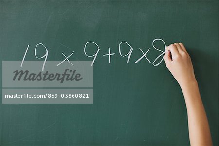 Human Hand Solving Math Problem