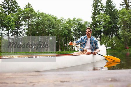 Man Canoeing, Columbia River Gorge, Oregon, USA