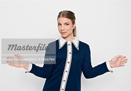 A Scandinavian woman pointing out the direction.