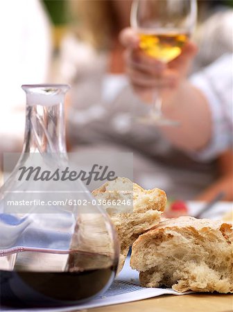 Wine, bread and people toasting, Sweden.