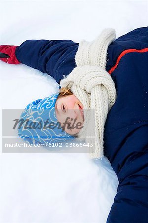 A girl playing in the snow, Sweden.