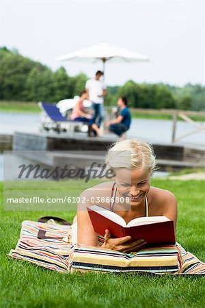 A woman reading a book, Sweden.