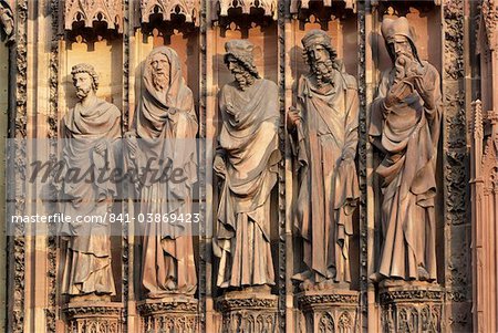 Statues on right side of central doorway of Notre-Dame Gothic cathedral, red sandstone, UNESCO World Heritage Site, Strasbourg, Alsace, France, Europe