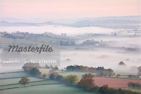 Mist covered countryside at dawn near Pennorth, Brecon Beacons National Park, Powys, Wales, United Kingdom, Europe