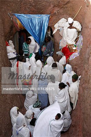 Pilgrims lining up to collect water from the Jordan River spring in Bieta Ghiorghis (St. George's House) church in Lalibela, Wollo, Ethiopia, Africa