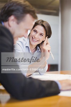 Business people laughing in office