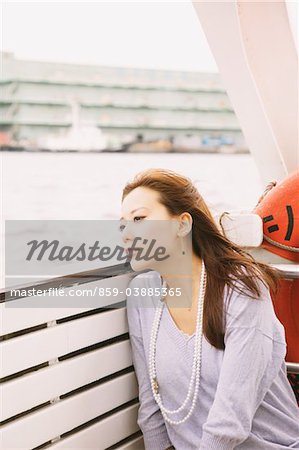 Japanese Women Sitting In Boat