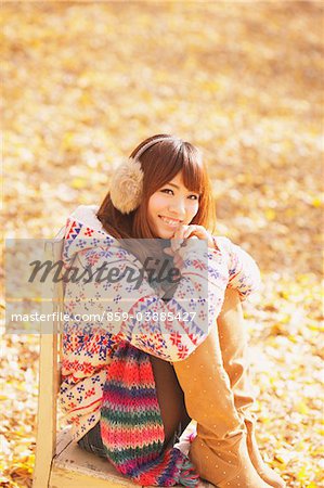 Japanese Women Sitting On Chair And Smiling