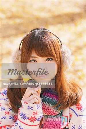 Japanese Women Holding Ginkgo Leaf