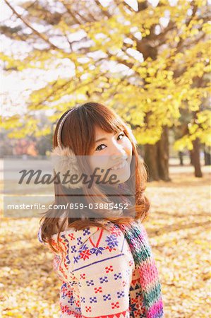 Japanese Women Smiling And Looking Back