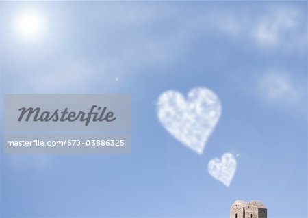 Maisons miniatures et coeur en forme de nuages Maisons miniatures et coeur en forme de nuages