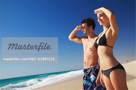 Couple standing on Floreat beach, Perth, Western Australia, Australia